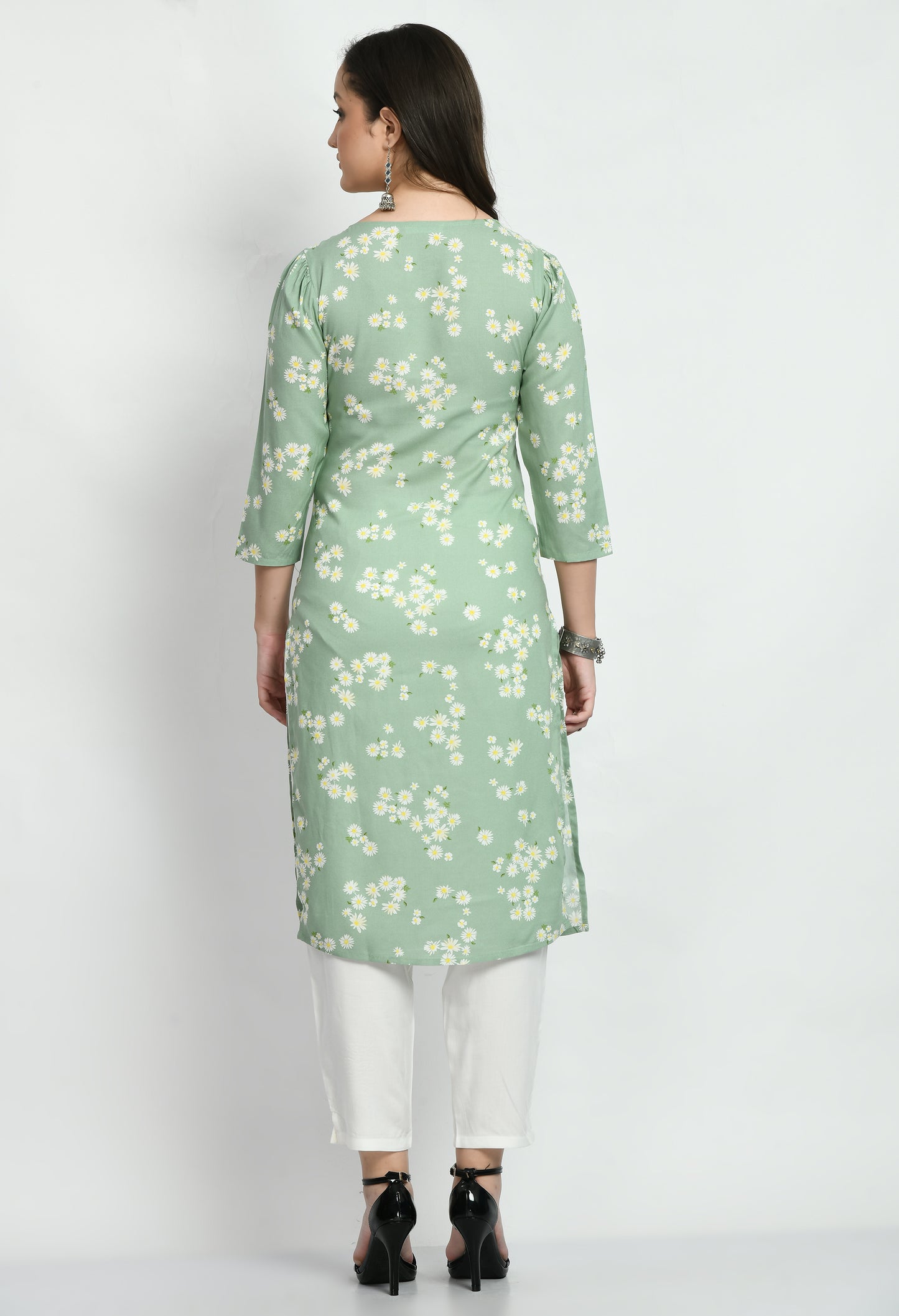 "Sea Green Printed Kurta with Solid Palazo featuring a flowing kurta with elegant prints and a classic neckline, paired with matching wide-leg palazo pants. The set combines a vibrant sea green color with a relaxed, comfortable fit."