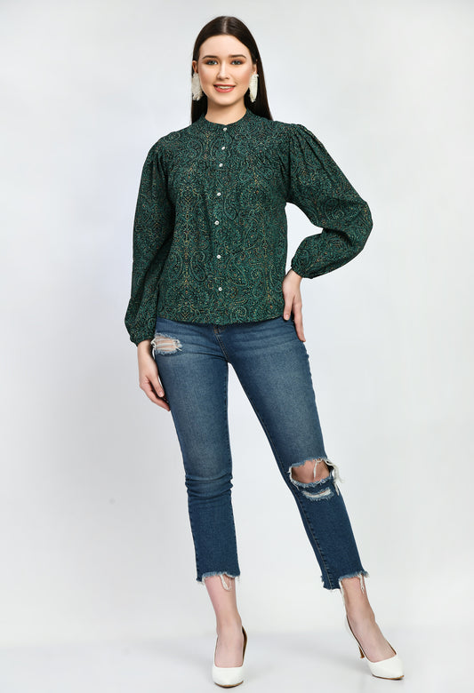 "A loose-fitting green rayon top with an airy, carefree style. With its soft, breathable fabric, it provides comfort and style for semi-formal and casual occasions alike.