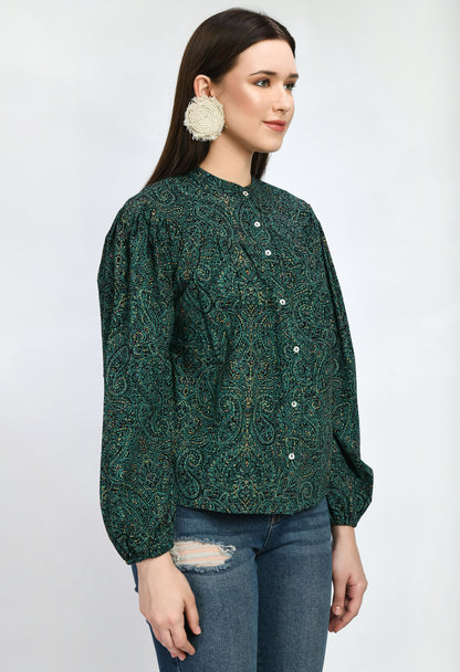 "A loose-fitting green rayon top with an airy, carefree style. With its soft, breathable fabric, it provides comfort and style for semi-formal and casual occasions alike.