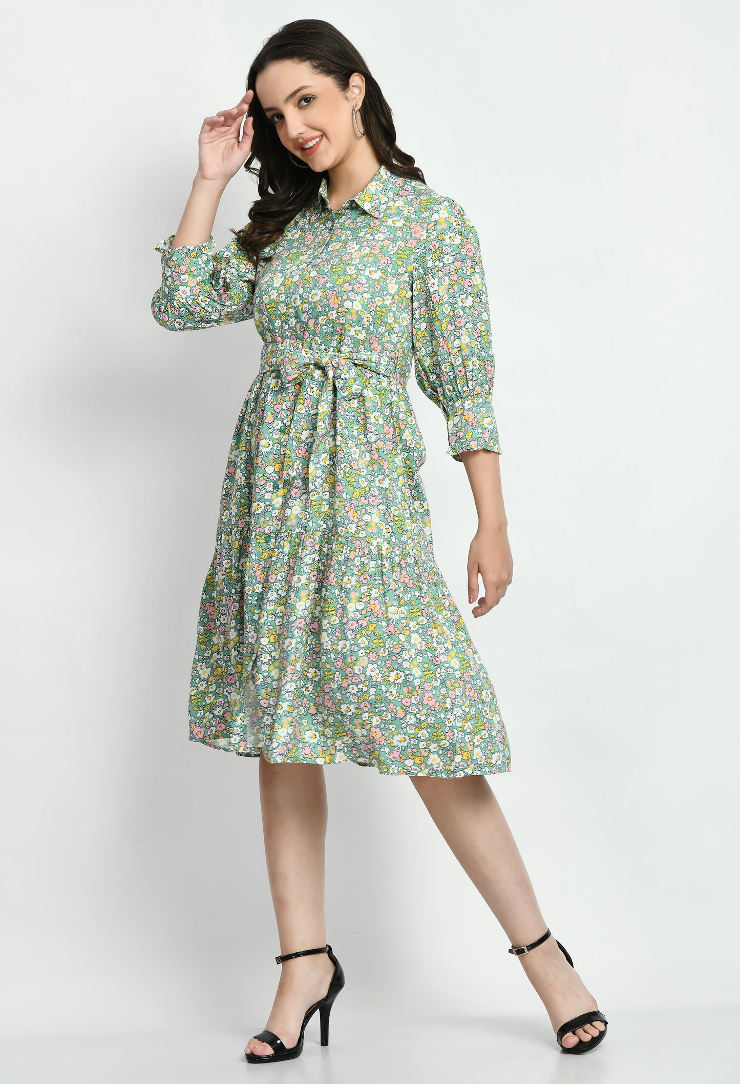 "Rayon Printed Ruffles Cuff Dress featuring a stylish A-line silhouette with a vibrant print. The dress has a flattering neckline and charming ruffle cuffs at the sleeve ends, offering a chic and comfortable look for casual wear."