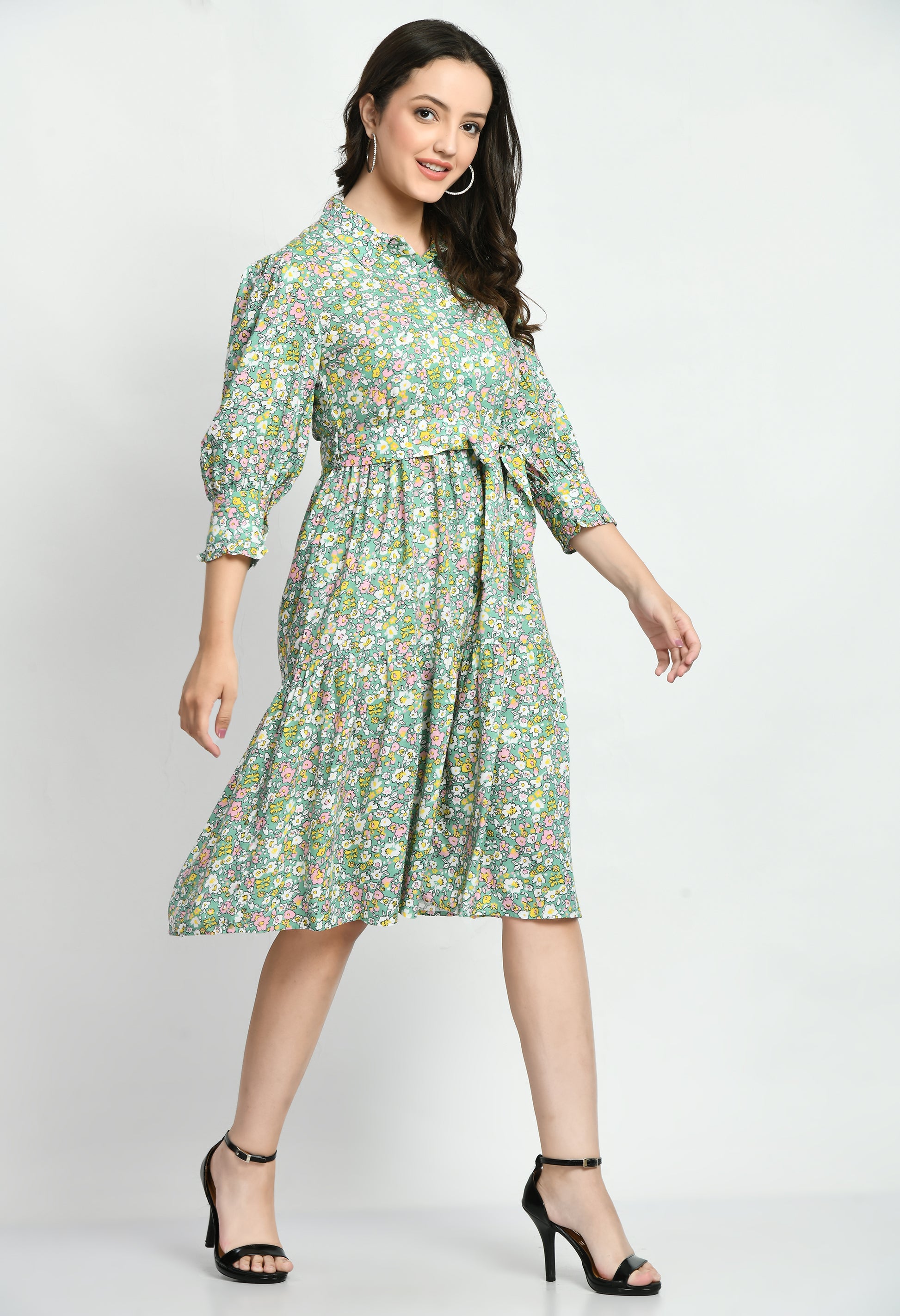 "Rayon Printed Ruffles Cuff Dress featuring a stylish A-line silhouette with a vibrant print. The dress has a flattering neckline and charming ruffle cuffs at the sleeve ends, offering a chic and comfortable look for casual wear."