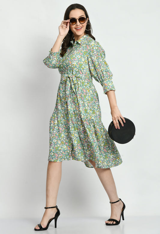 "Rayon Printed Ruffles Cuff Dress featuring a stylish A-line silhouette with a vibrant print. The dress has a flattering neckline and charming ruffle cuffs at the sleeve ends, offering a chic and comfortable look for casual wear."