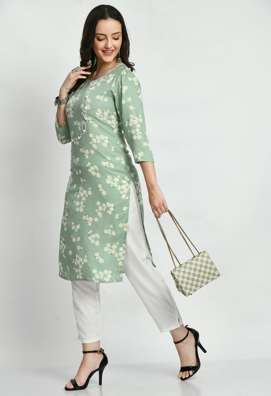 "Sea Green Printed Kurta with Solid Palazo featuring a flowing kurta with elegant prints and a classic neckline, paired with matching wide-leg palazo pants. The set combines a vibrant sea green color with a relaxed, comfortable fit."