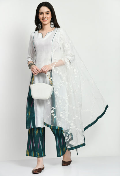 An exquisite Anarkali Kurta set with a flowing, finely designed Kurta, Ikkat-patterned pants, and a gorgeously embroidered dupatta. Perfect for celebrations and unique gatherings, this ensemble blends classic elegance with contemporary refinement.