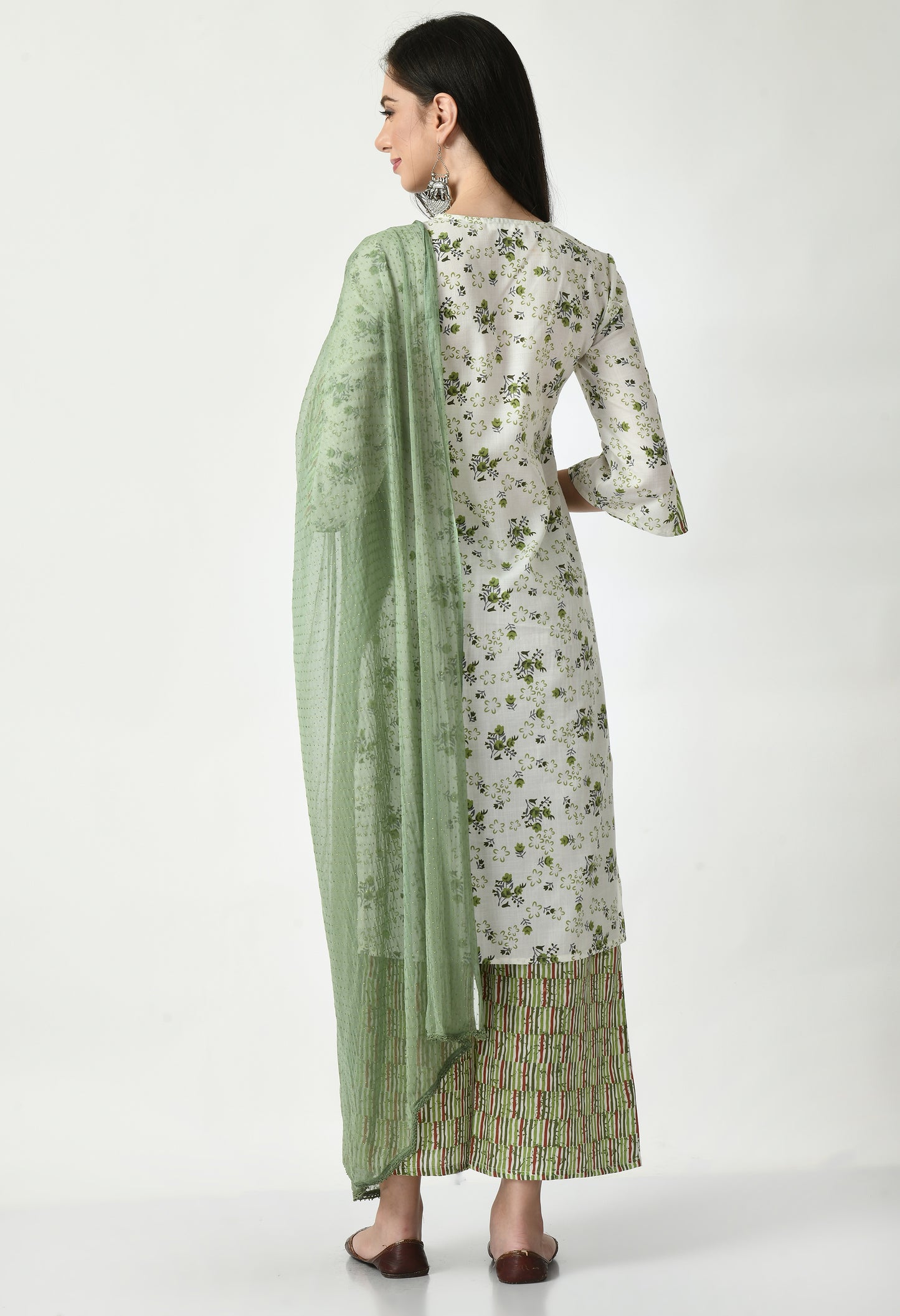 "Elegant women's ethnic ensemble featuring a printed kurta, palazzo pants, and a matching dupatta. The set showcases intricate patterns and a stylish design, ideal for festive or casual occasions."