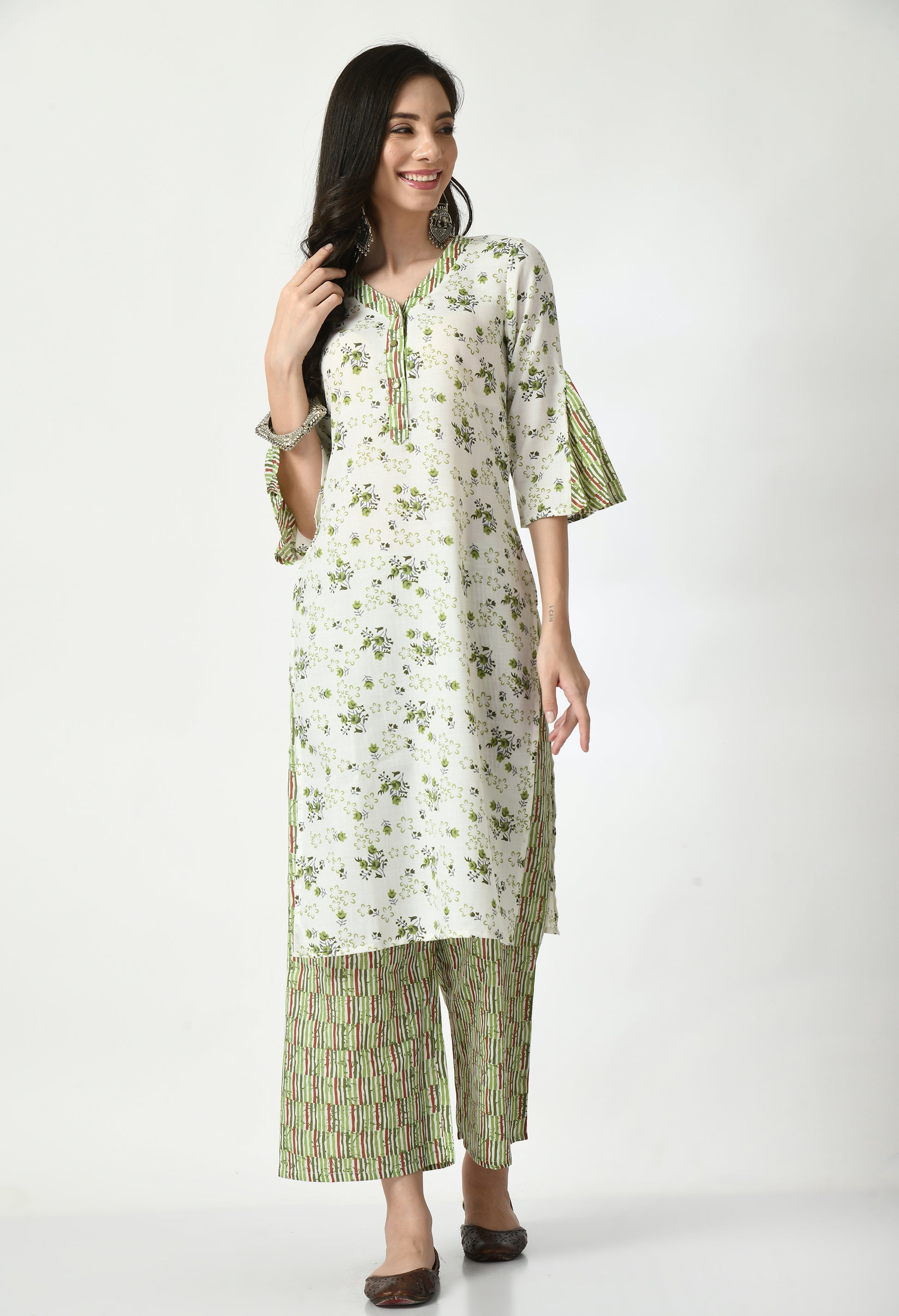 "Elegant women's ethnic ensemble featuring a printed kurta, palazzo pants, and a matching dupatta. The set showcases intricate patterns and a stylish design, ideal for festive or casual occasions."