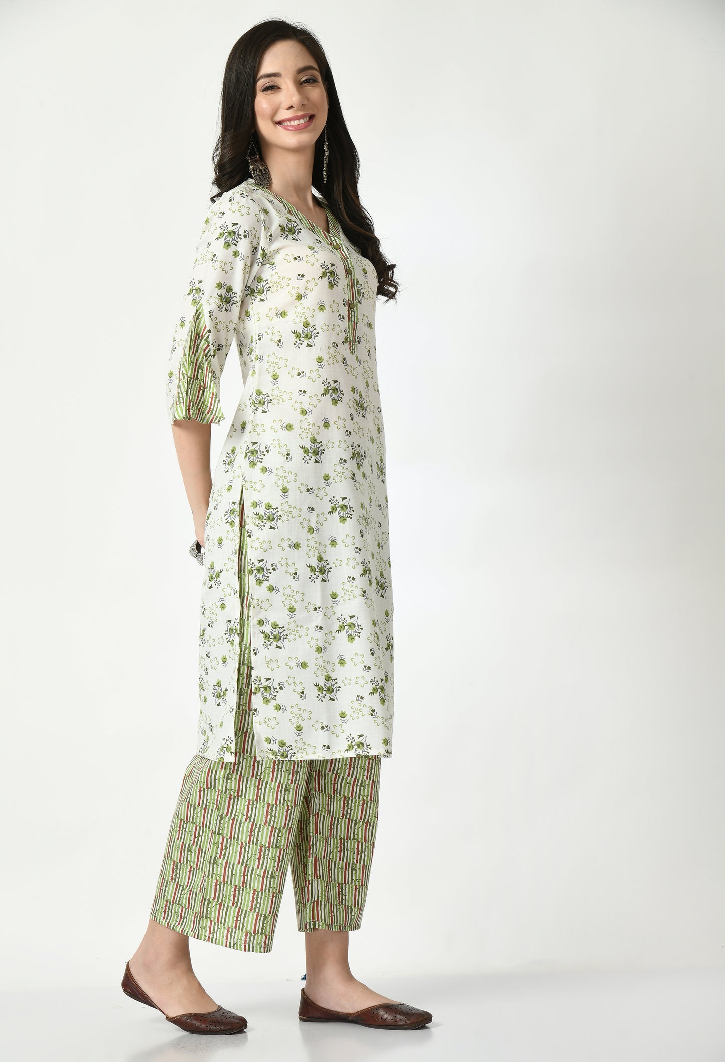 "Elegant women's ethnic ensemble featuring a printed kurta, palazzo pants, and a matching dupatta. The set showcases intricate patterns and a stylish design, ideal for festive or casual occasions."