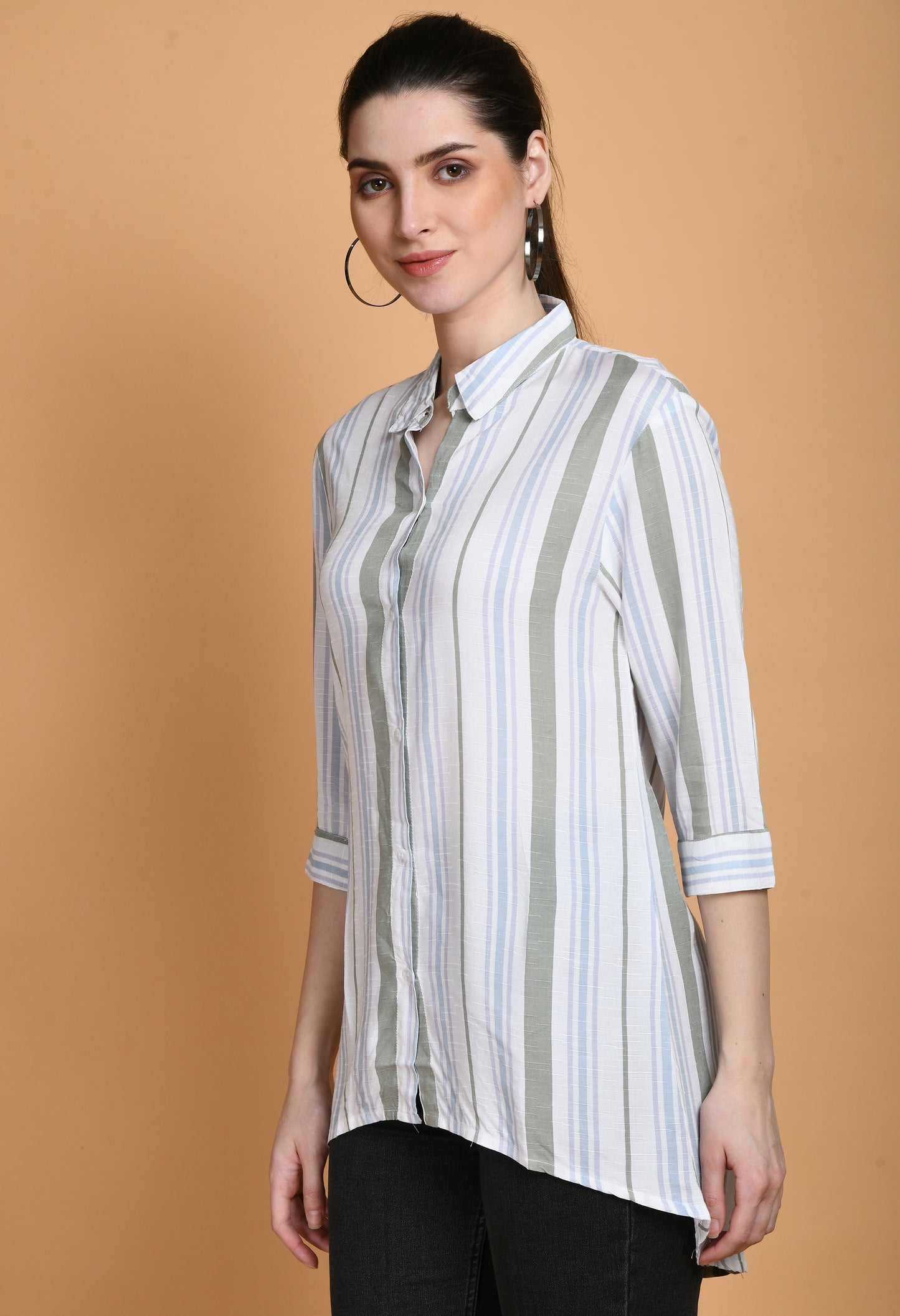 The Rayon White Stripes Shirt has a classic tailored style with vertical white stripes. The shirt has a traditional collar, long sleeves with buttoned cuffs, and a button-down front. Because of the softness and breathability of the rayon fabric, it combines comfort and style."