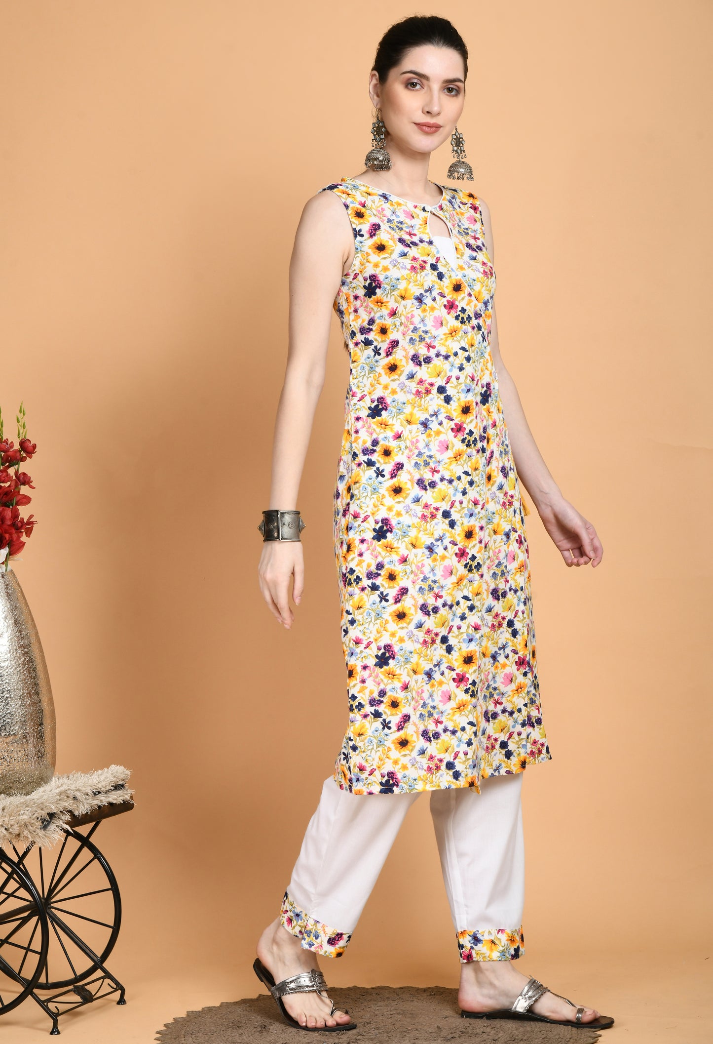 "Rayon Printed Kurta with Solid Pajama featuring a flowing, printed kurta with a classic neckline and short or three-quarter sleeves, paired with a comfortable solid pajama. The kurta's vibrant print and the pajama's simple, elegant design create a chic and effortless look."