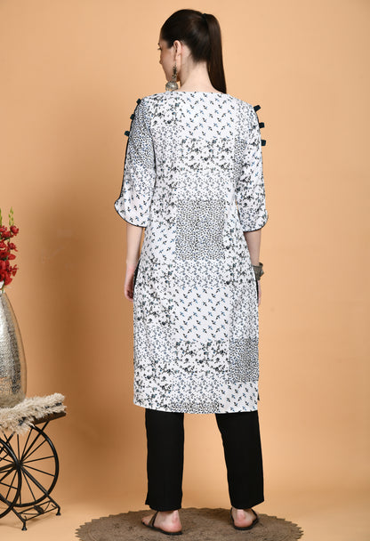 "White Printed Kurta with elegant patterns and stylish sleeves. The kurta features a classic neckline, unique sleeve details such as ruffles or bell shapes, and a comfortable, flowing fit."