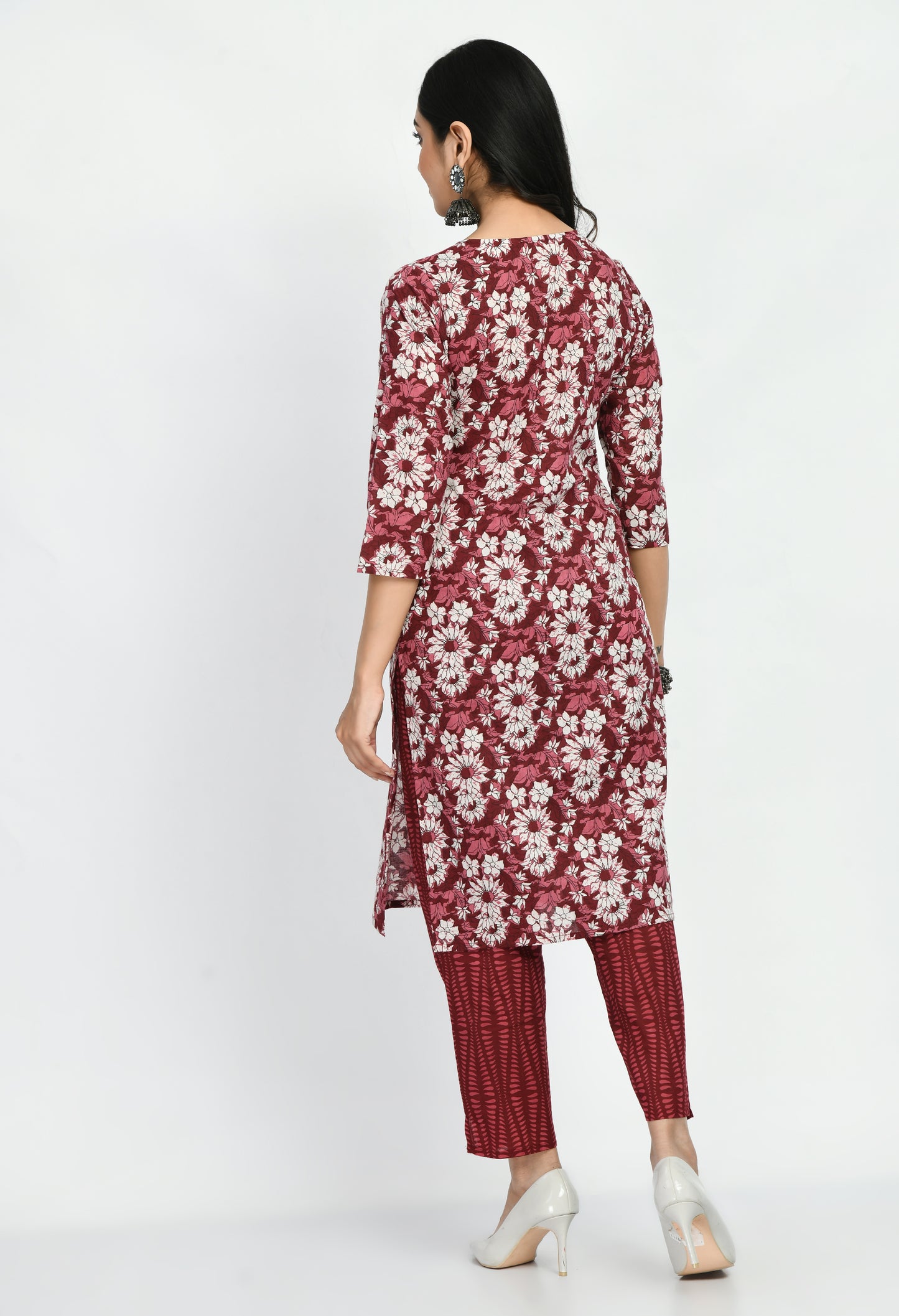 “Maroon cotton printed kurta with matching pants. The kurta features intricate prints and a rich maroon color, paired with coordinating pants, combining elegance with comfort for a versatile look suitable for casual and semi-formal occasions.”