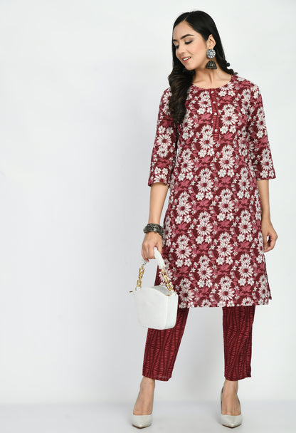 “Maroon cotton printed kurta with matching pants. The kurta features intricate prints and a rich maroon color, paired with coordinating pants, combining elegance with comfort for a versatile look suitable for casual and semi-formal occasions.”