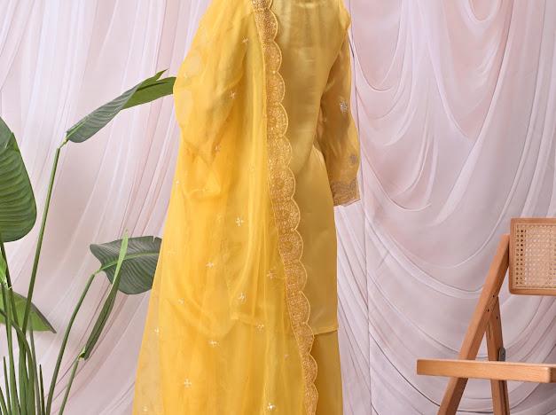Women Vibrant Mustard Yellow Kurta with Sharara Pants & Embroidered Net Dupatta Set