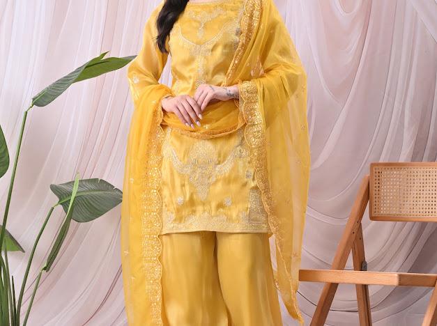Women Vibrant Mustard Yellow Kurta with Sharara Pants & Embroidered Net Dupatta Set