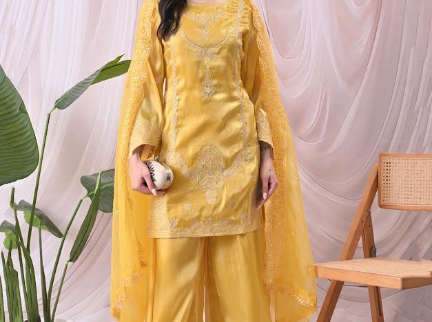 Women Vibrant Mustard Yellow Kurta with Sharara Pants & Embroidered Net Dupatta Set