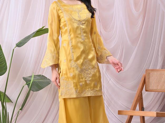 Women Vibrant Mustard Yellow Kurta with Sharara Pants & Embroidered Net Dupatta Set